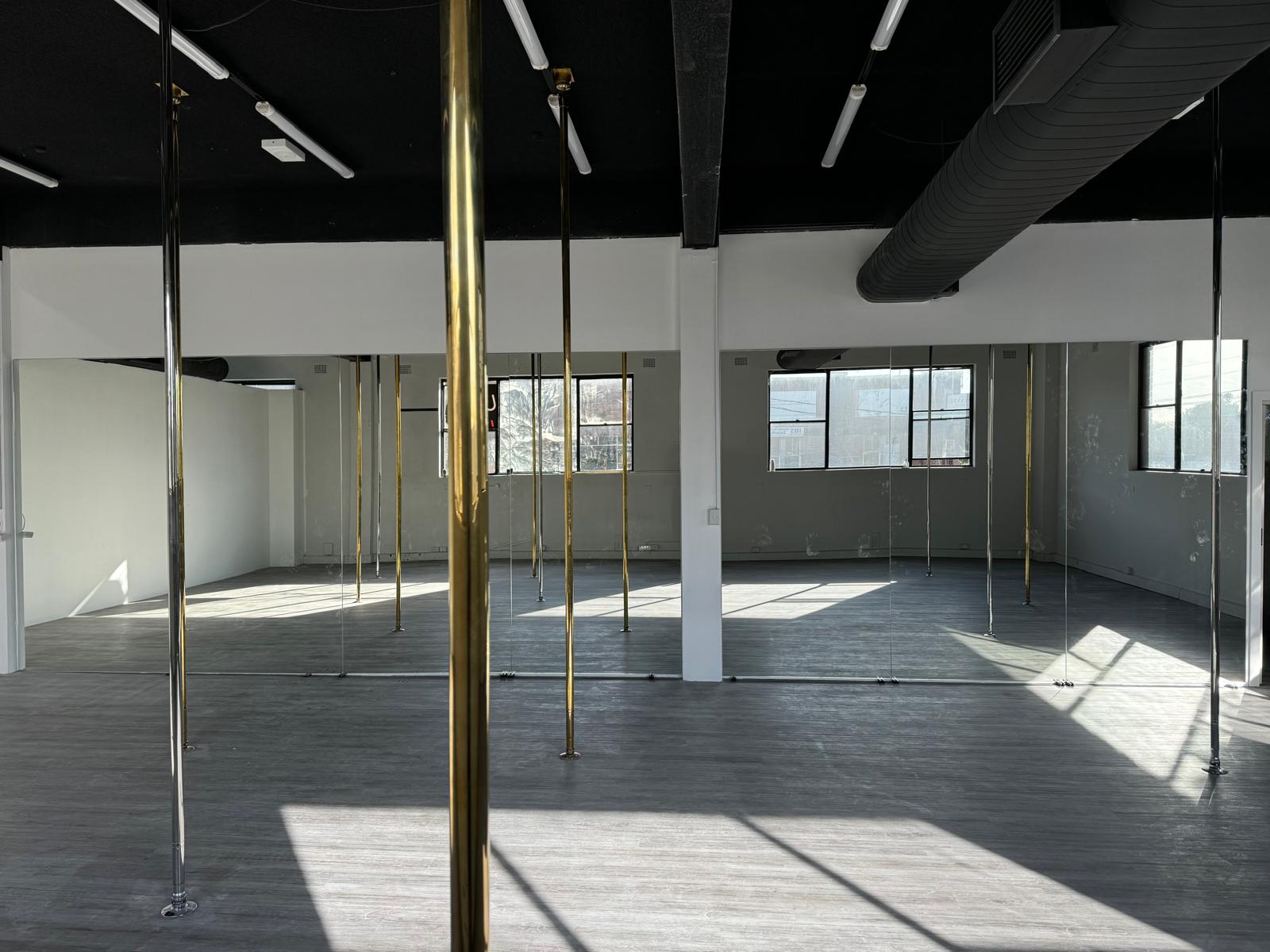 Side angle of studio mirror wall Sydney in dance and fitness training space