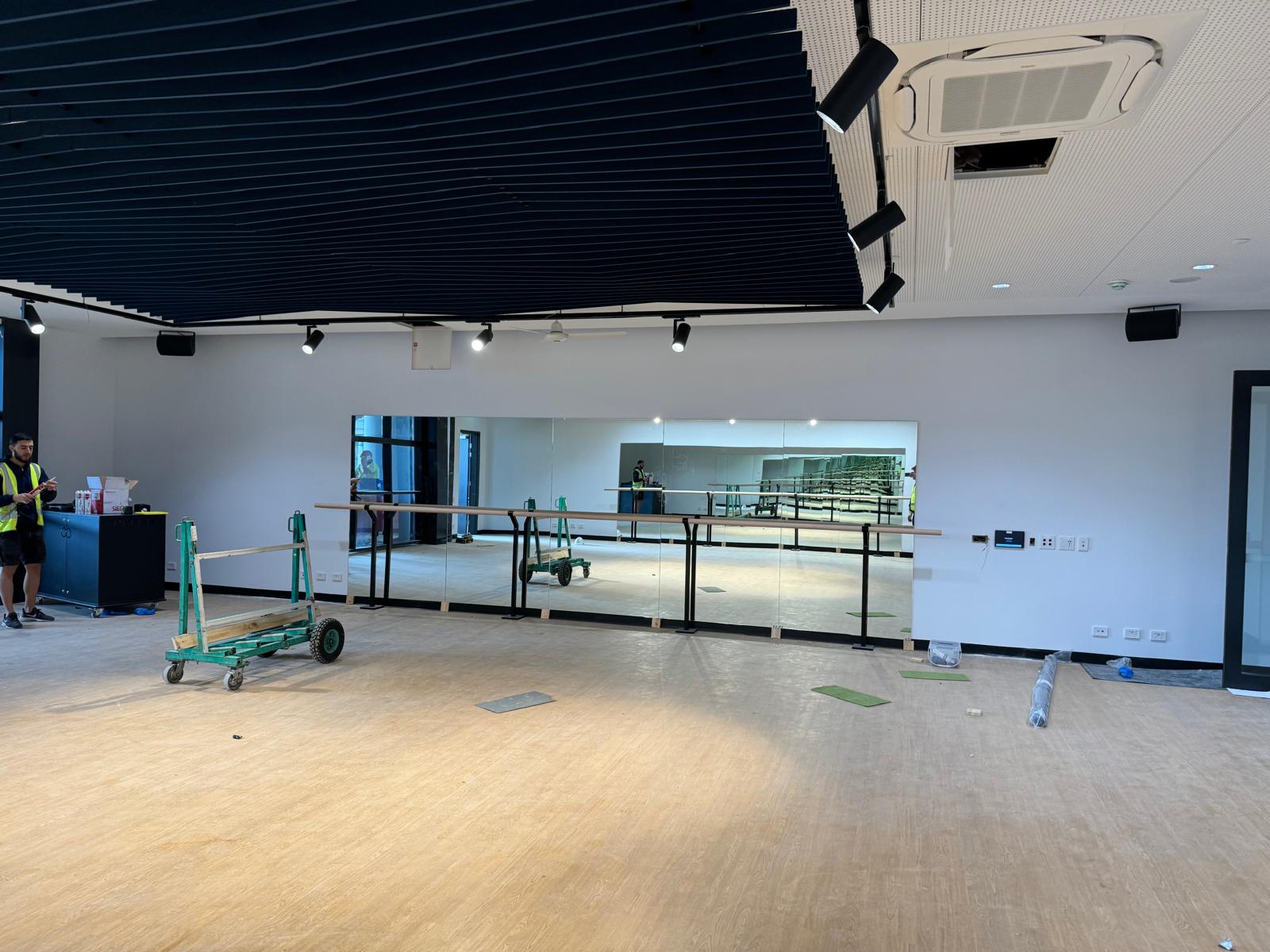 Full wall ballet studio mirrors Sydney installed in school dance room with barres