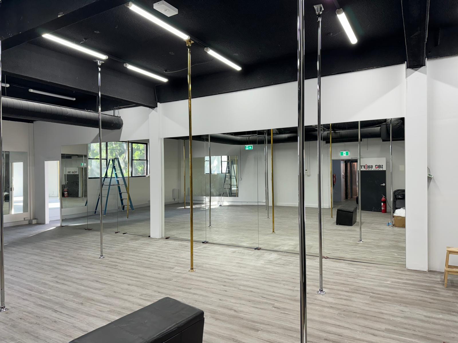 Full length studio mirror wall Sydney in dance and fitness training space